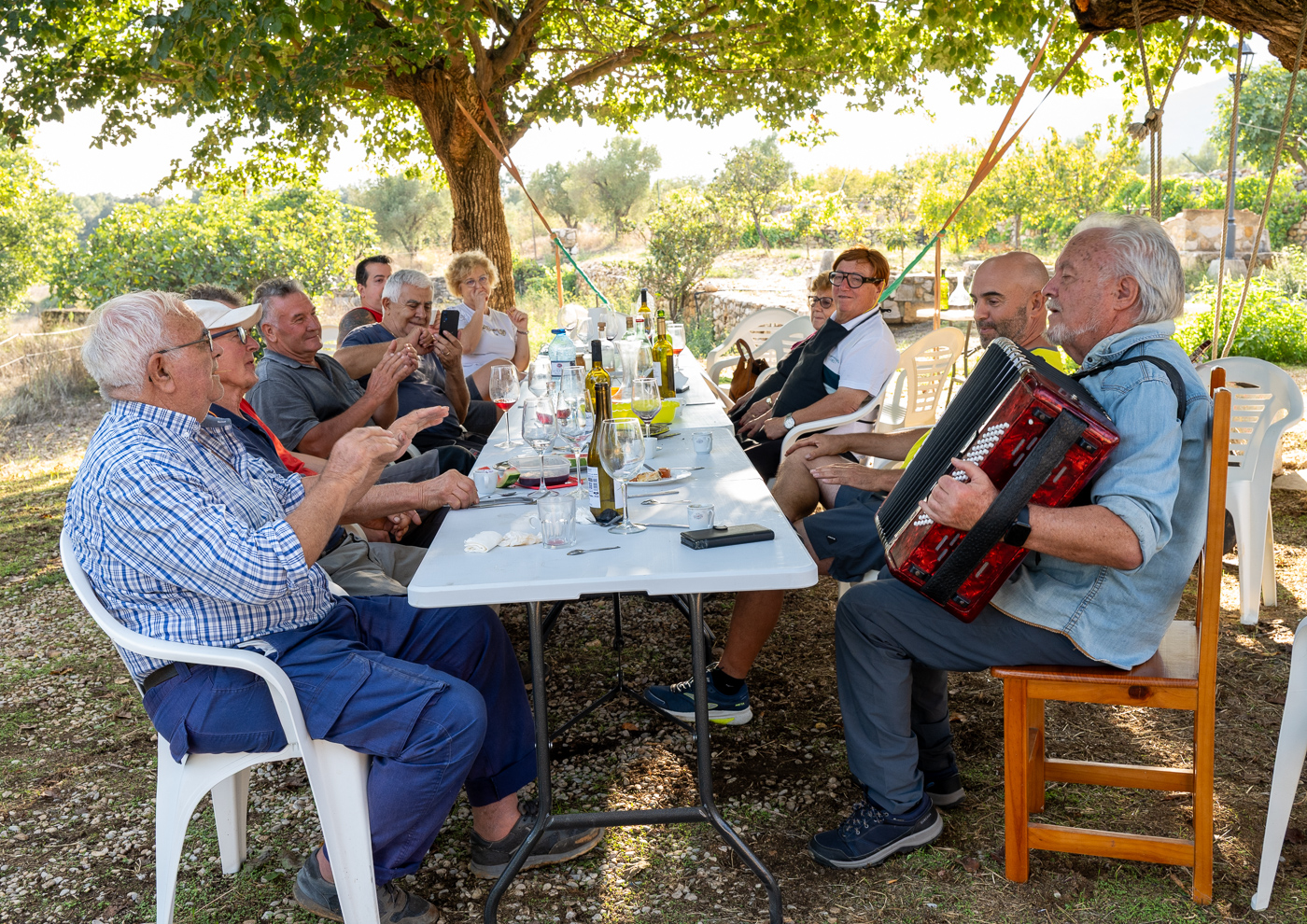 The older men joined in and sang to the accordion songs.